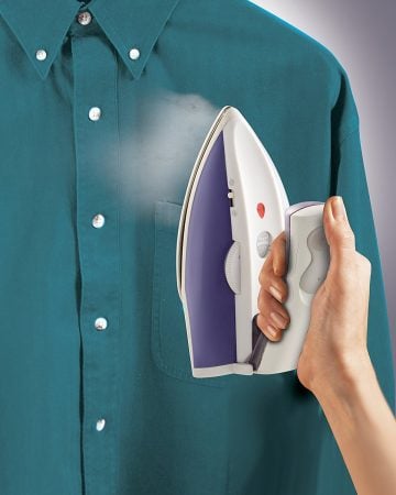 Image of Hamilton Travel Iron Steaming a Shirt