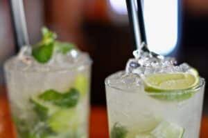 Two crushed ice cocktails with lime