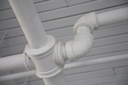 Outdoor white water pipes.