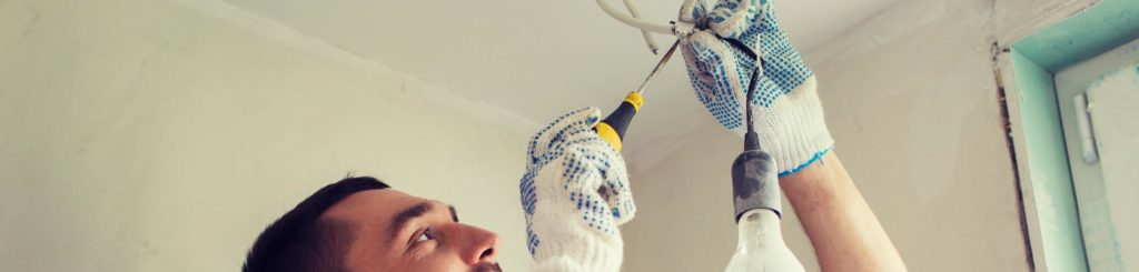 Electrician Changing Light Fixture