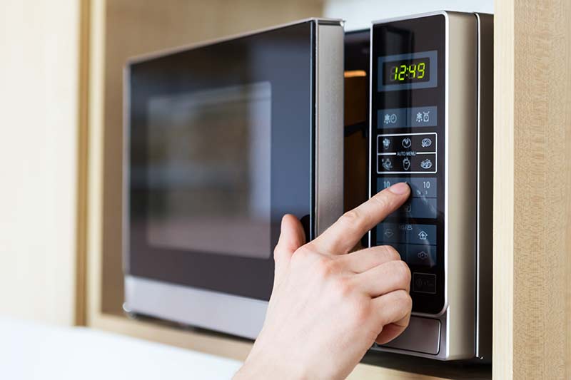 Here's How Long Microwaves Last (4 Aging Microwave Signs)