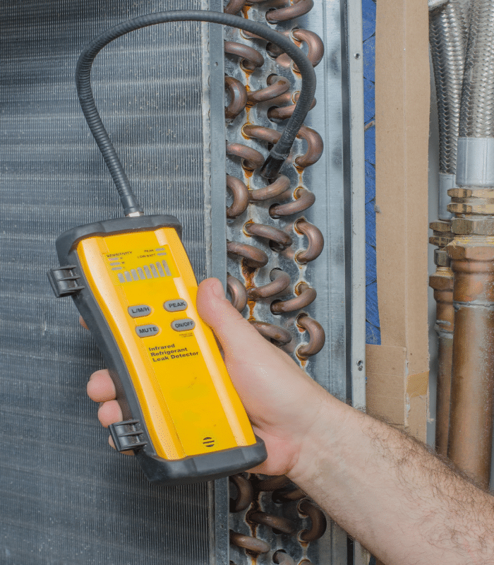 Checking Freon using a leak detector 