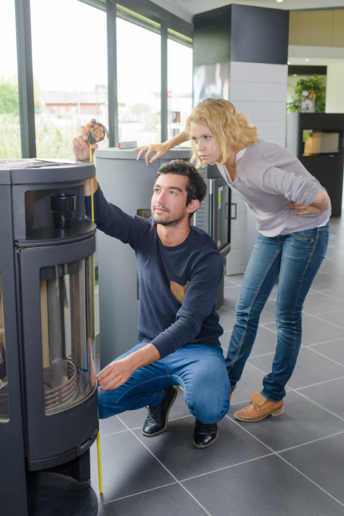 woman and man checking furnaces