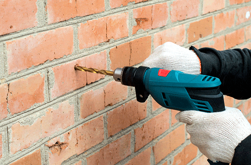 Drilling into brick with a drill