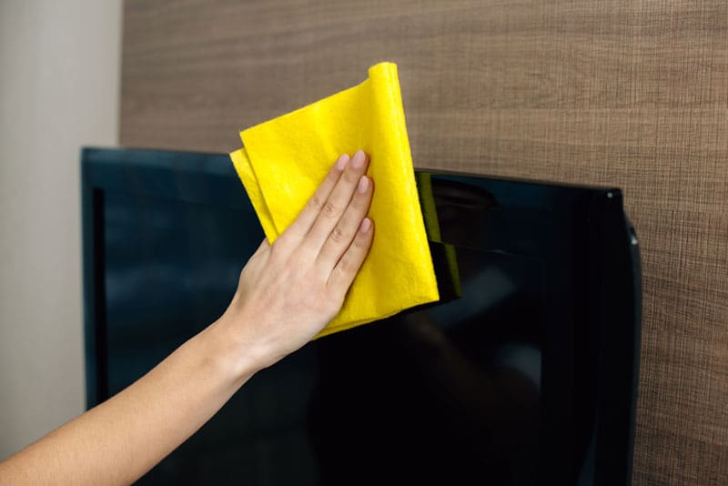 Cleaning tv with a microfiber cloth