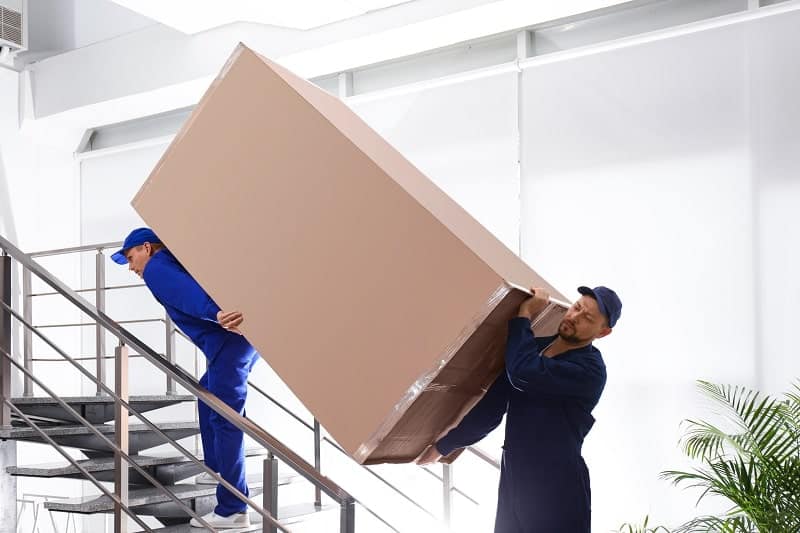 Transporting a refrigerator into a new house