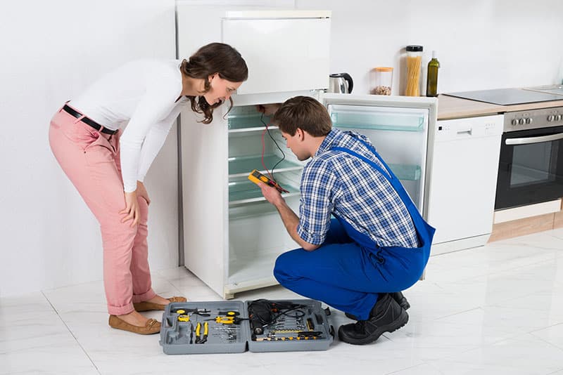 a refrigerator technician