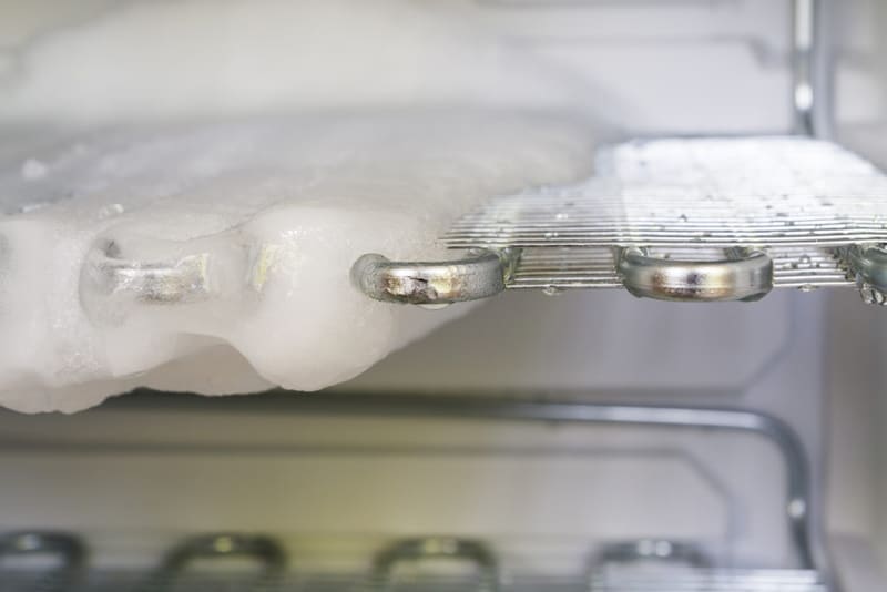 Defrosting a frozen freezer