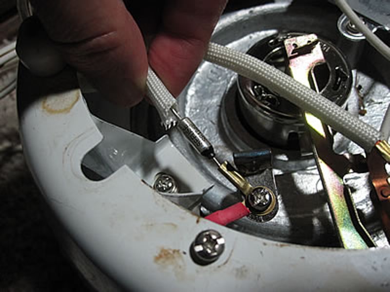 https://applianceanalysts.com/wp-content/uploads/2022/01/Replacing-Rice-Cooker-Thermal-Fuse.jpg