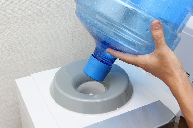 Replacing water cooler jug