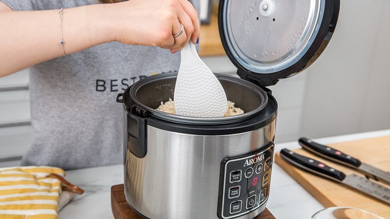 Taking out rice from rice cooker