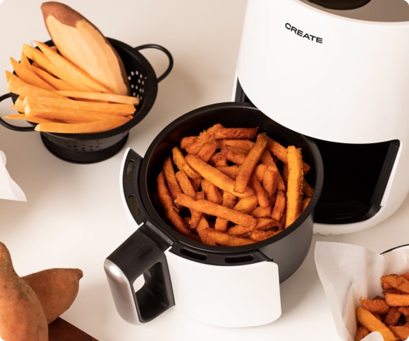 Air Fryer with some fryes inside