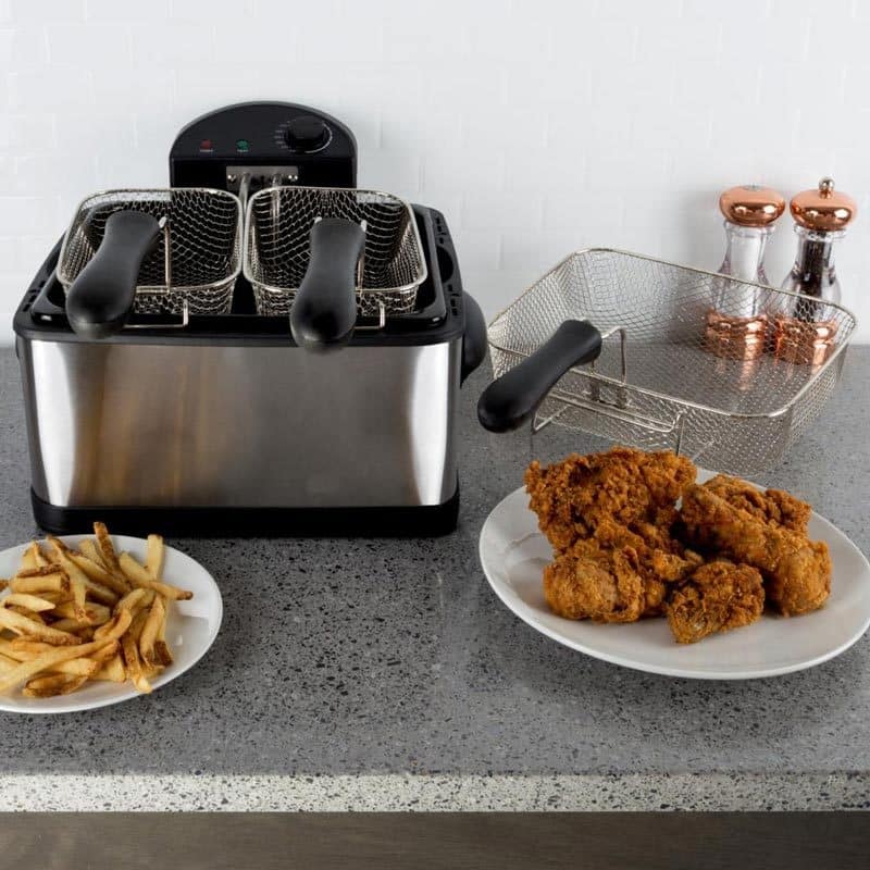 Deep Fryer With Fried Food Around
