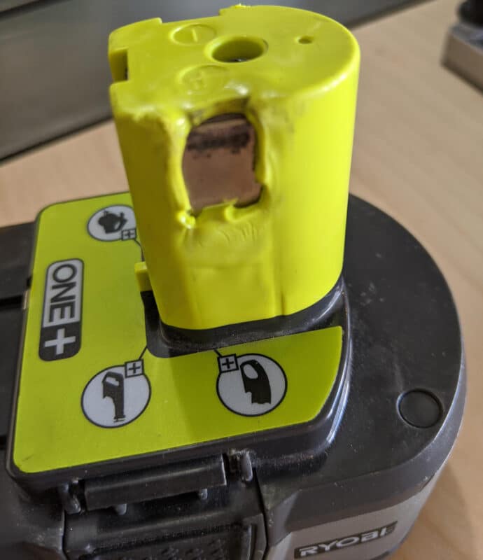 Deffective And Melted Ryobi Battery Connected To Charger