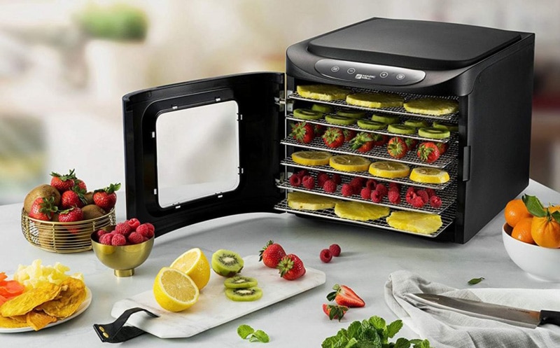 Food Dehydrator beeing used with fruits