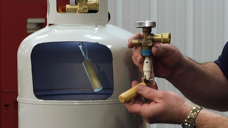 Man Showing OPDS Propane Tank System