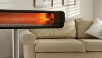 Modern electric heater in living room