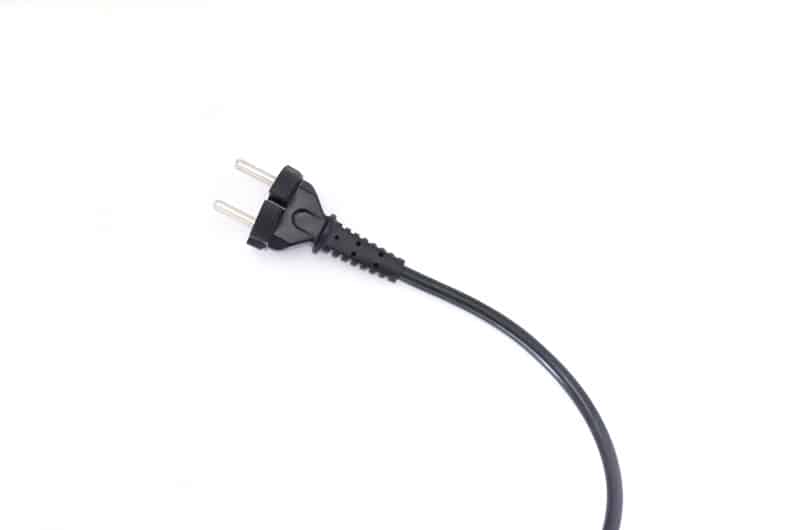 black power cord in white background