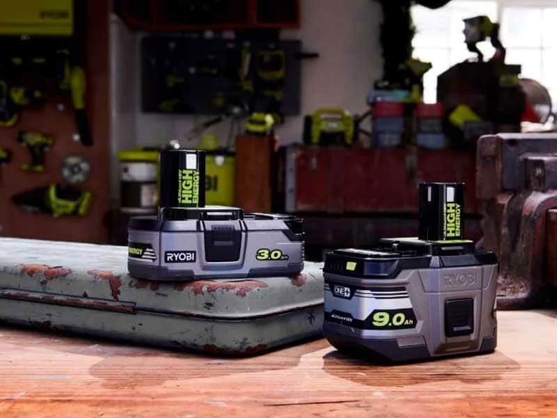 Two Ryobi Battery Chargers With Ryiobi Battery Connected