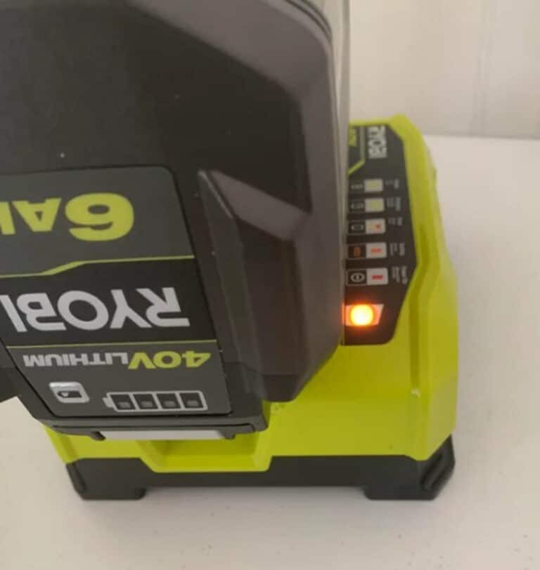 Why A Ryobi Battery Charger Flashes Green (& What To Do)