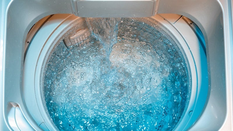 Inside Of A Washer Getting Overfilled