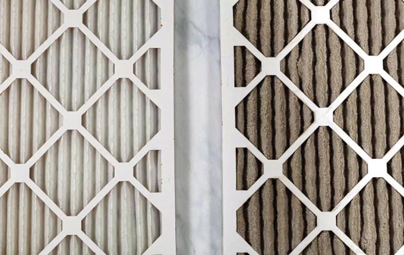 One clean AC Filter Next to a dirty AC filter