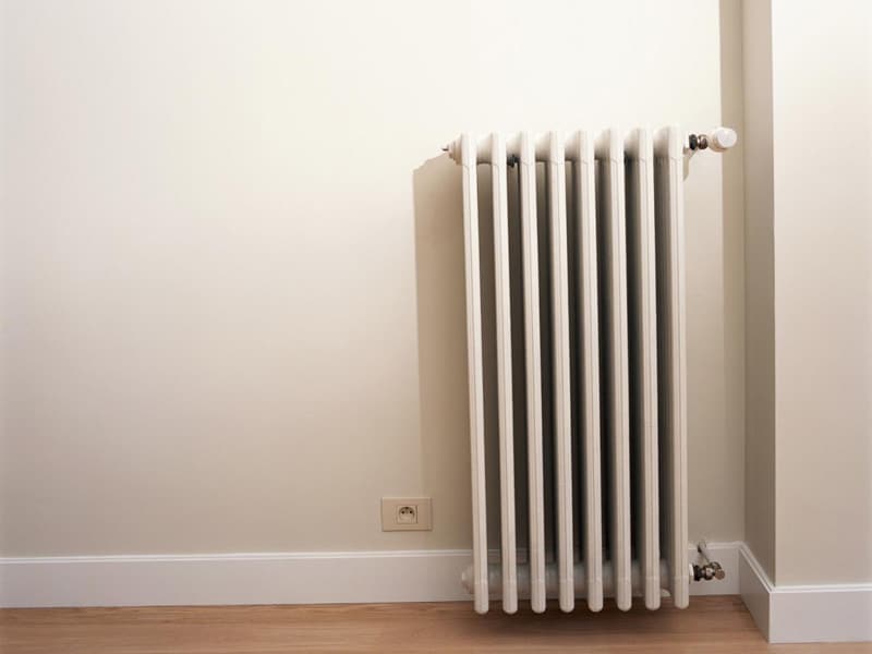 Small Radiator Installed On Wall