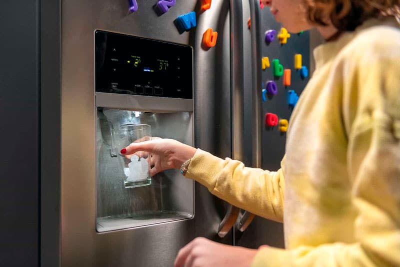 woman with ice maker