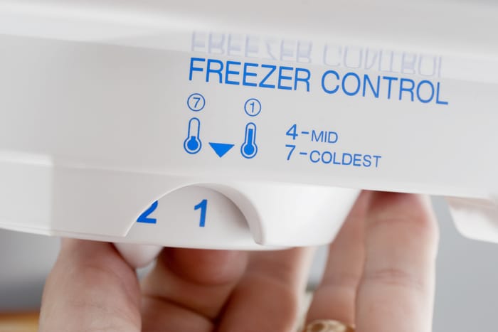 A freezer's temperature dial knob