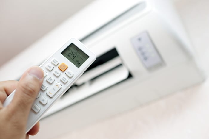 An Air Conditioner being adjusted