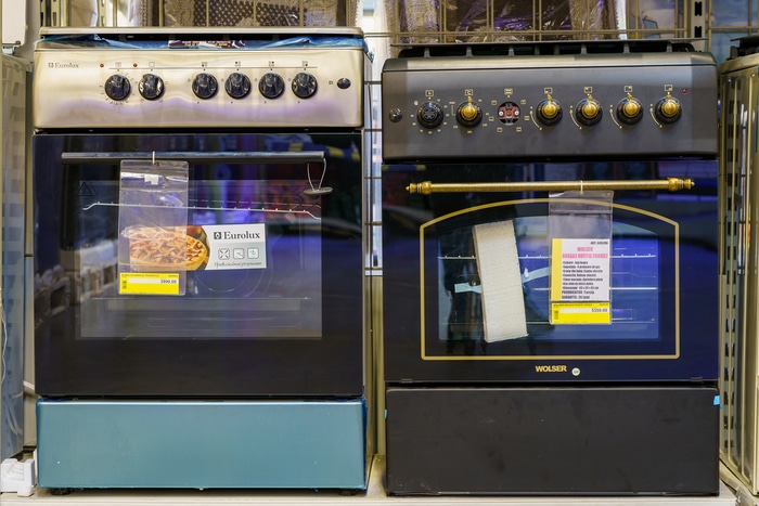 Range ovens on display in a store
