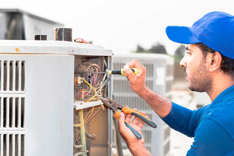 Technician Solving Electrical Issues