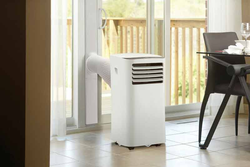 Portable Air Conditioner Installed On Kitchen