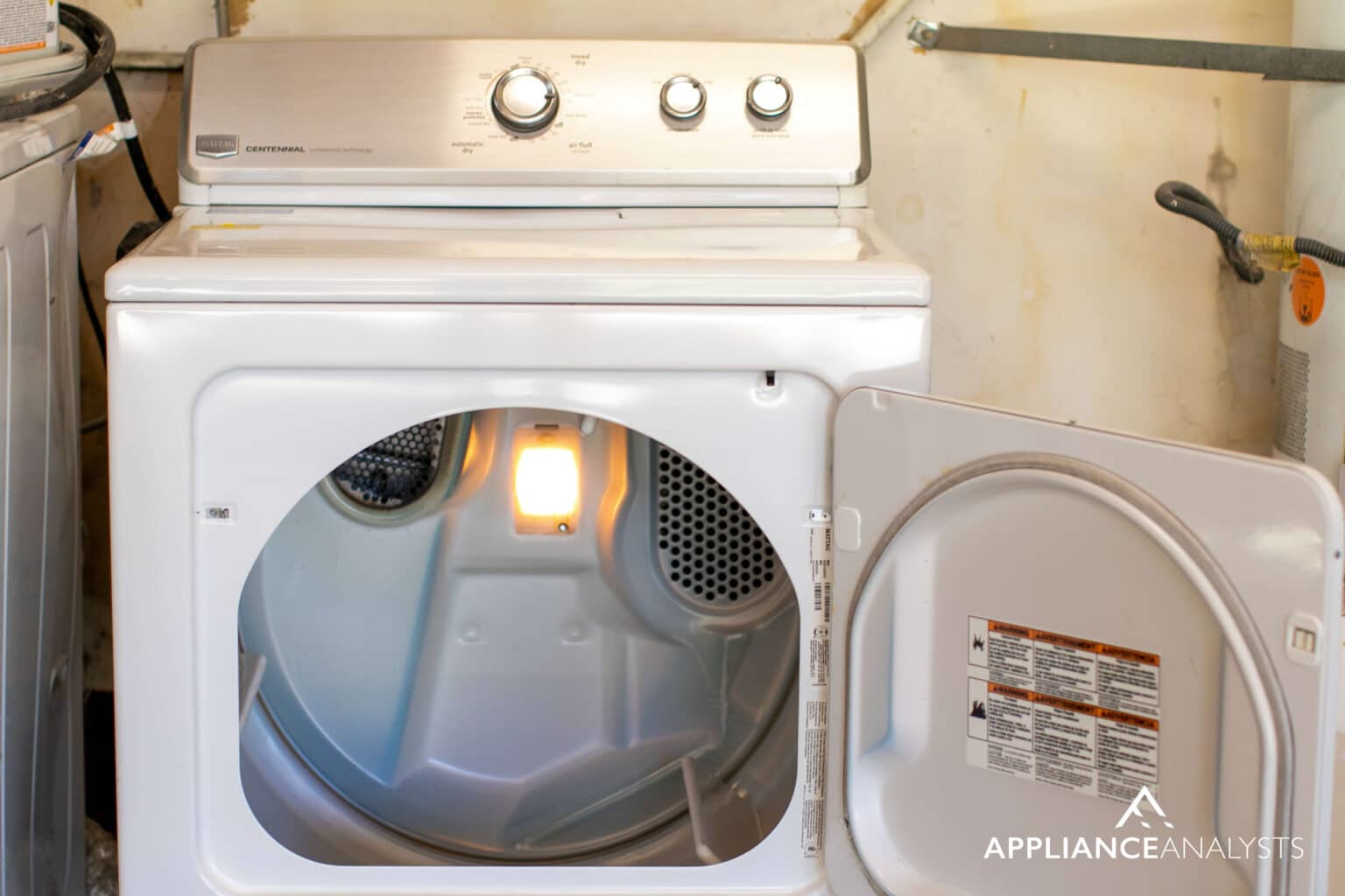 Why Your Dryer Keeps Spinning With The Door Open [Solved]