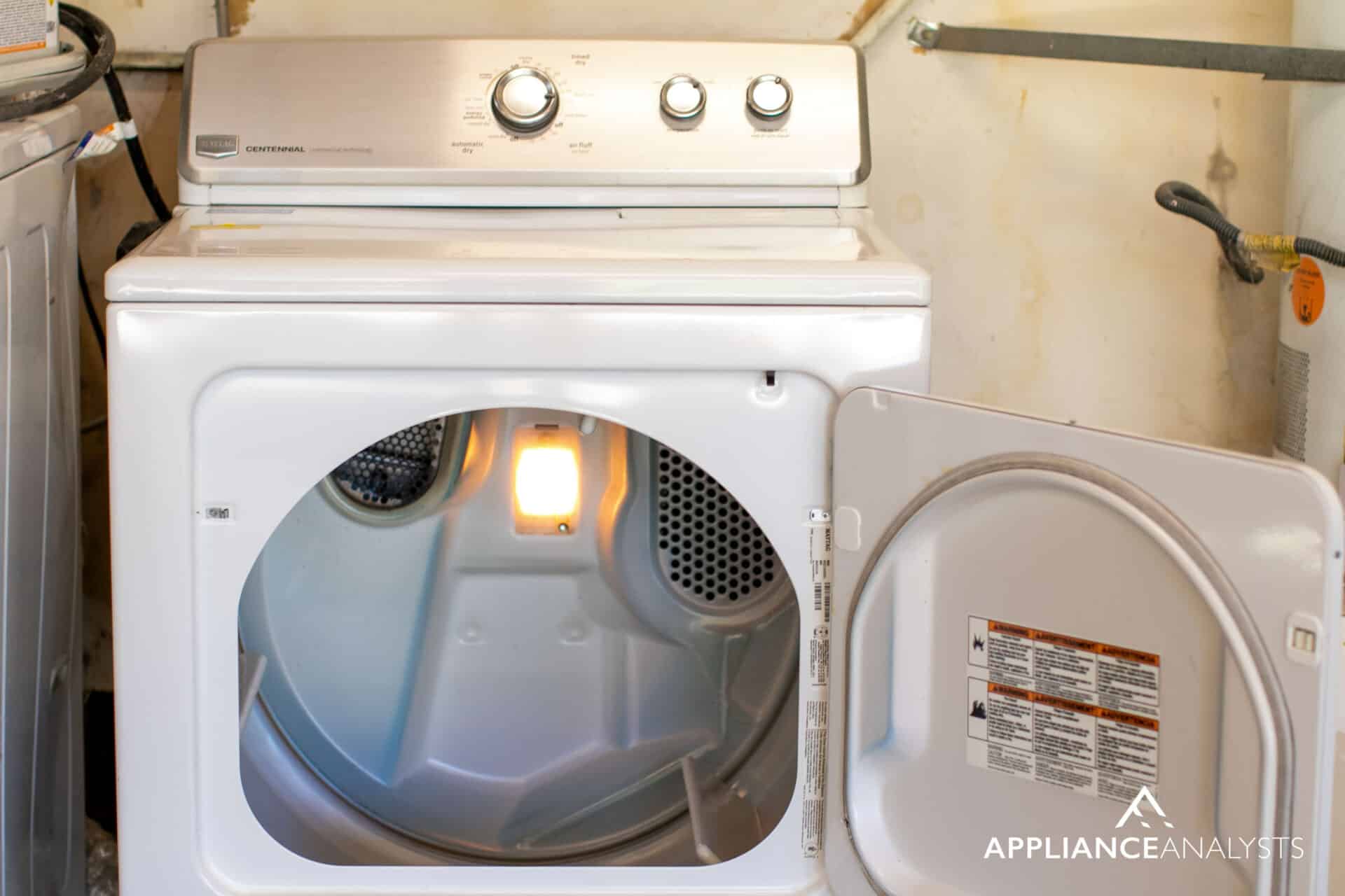 Why Your Dryer Keeps Spinning With The Door Open [Solved]