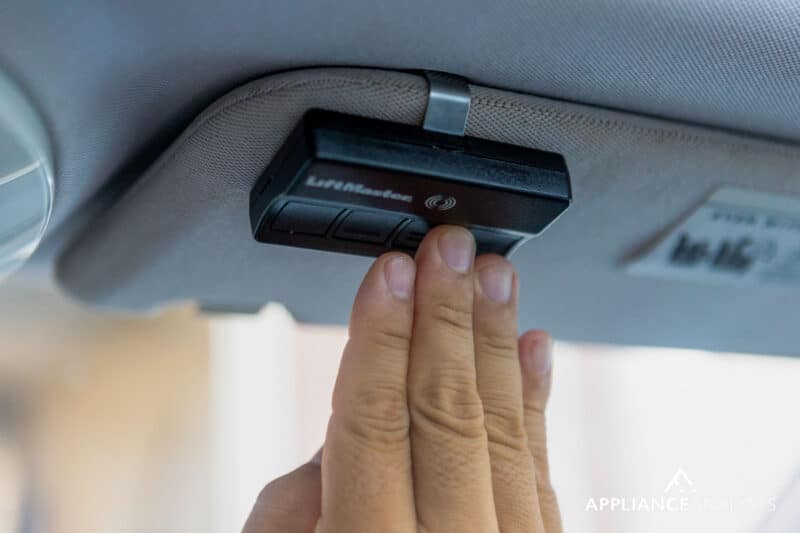 Garage door opener remote in a car