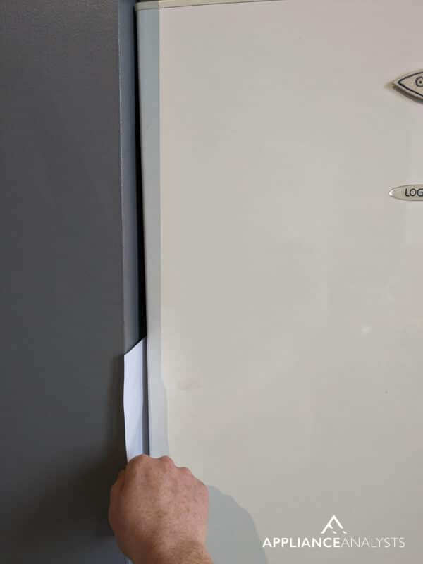 paper in fridge door