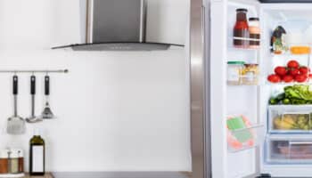 An open fridge in a kitchen