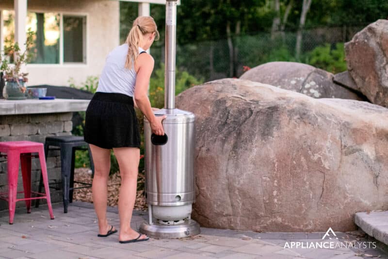 Removing patio heater tank cover